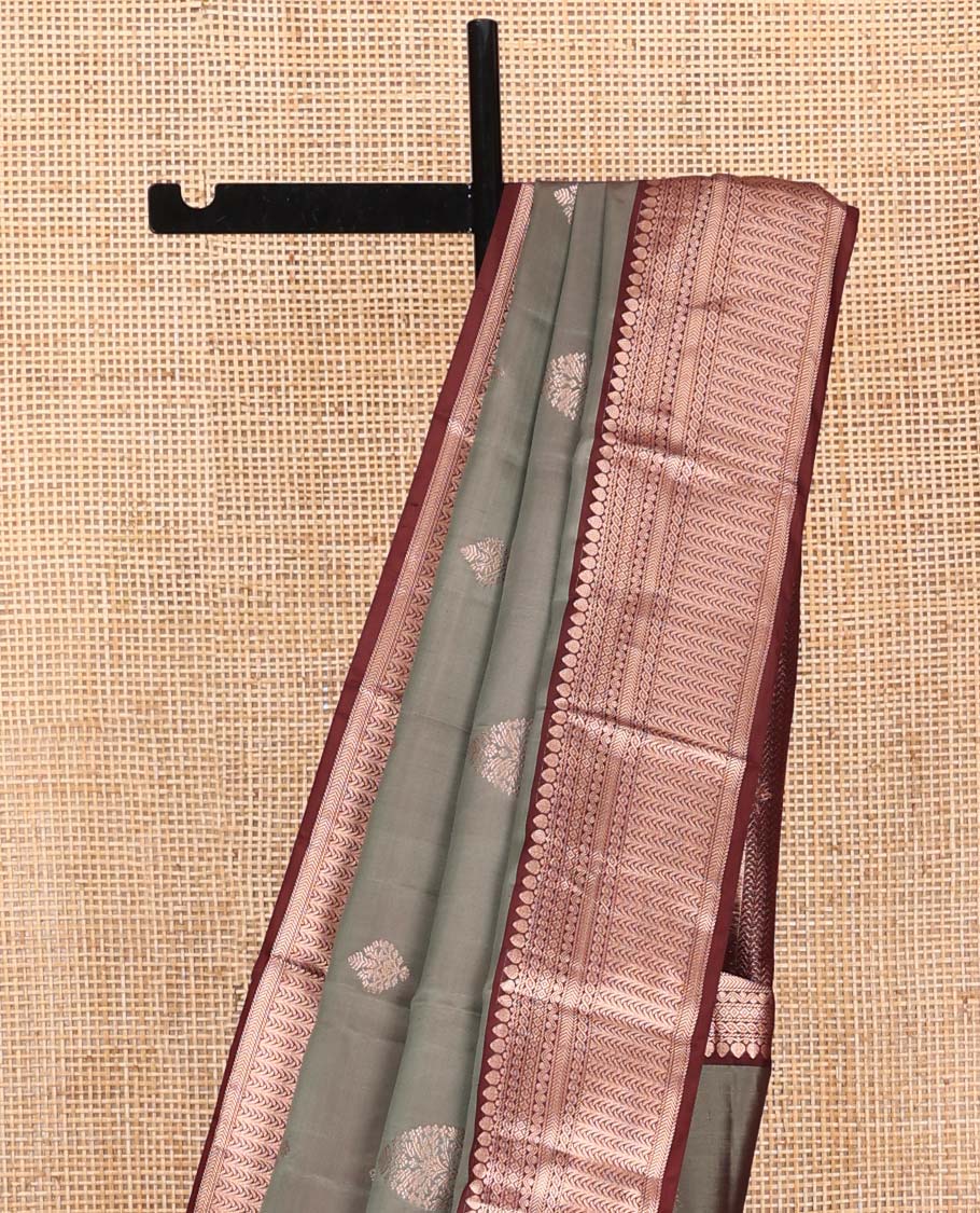 Grey Vasundhara Silk Saree, Finely Crafted with Zari Buttas on Its Body, Complemented by Contrast Border of Thilakam Mokku, Diamond, Rettai Neli, and Kathir Designs, Intricately Designed Pallu, and Paired with a Contrast Blouse