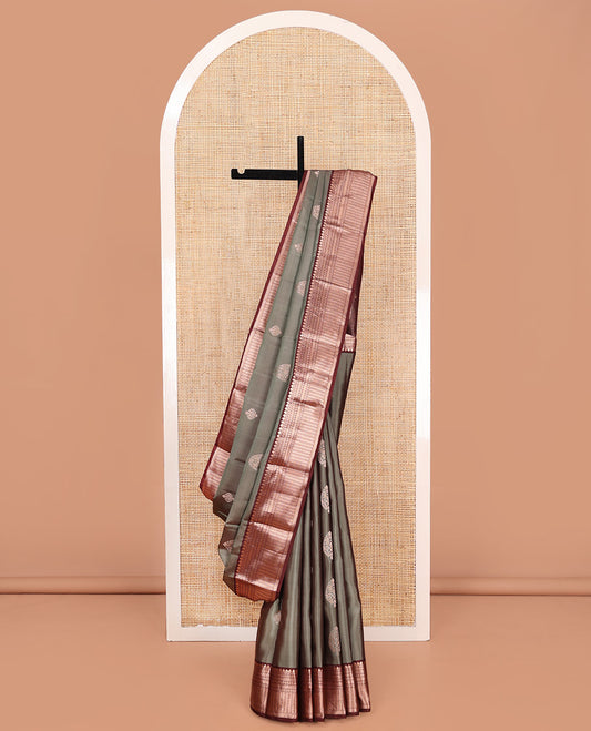 Grey Vasundhara Silk Saree, Finely Crafted with Zari Buttas on Its Body, Complemented by Contrast Border of Thilakam Mokku, Diamond, Rettai Neli, and Kathir Designs, Intricately Designed Pallu, and Paired with a Contrast Blouse