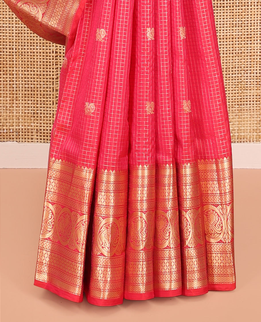 Red Vasundhara Silk Saree, Enriched with Zari Buttas and Checks All Over Its Body, Highlighted by Zari Border of Rekku, Mayil Kann, Vanki, Then Kuli Kann, and Round Mayil Designs, Grand Pallu of Butta Enclosed Checks, and Paired with a Matching Blouse