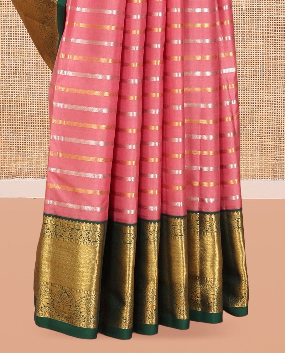 Pink Vasundhara Silk Saree, Embellished with Zari Stripes, a Contrast Border of Jaal, and Chakram Designs, a Diagonally Striped Pallu, and a Contrast Blouse