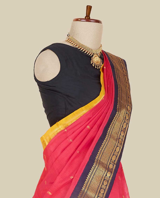 Peach gadwal cotton saree with paisley buttas, ganga jamuna border of chevron & rudraksha, intricately designed pallu