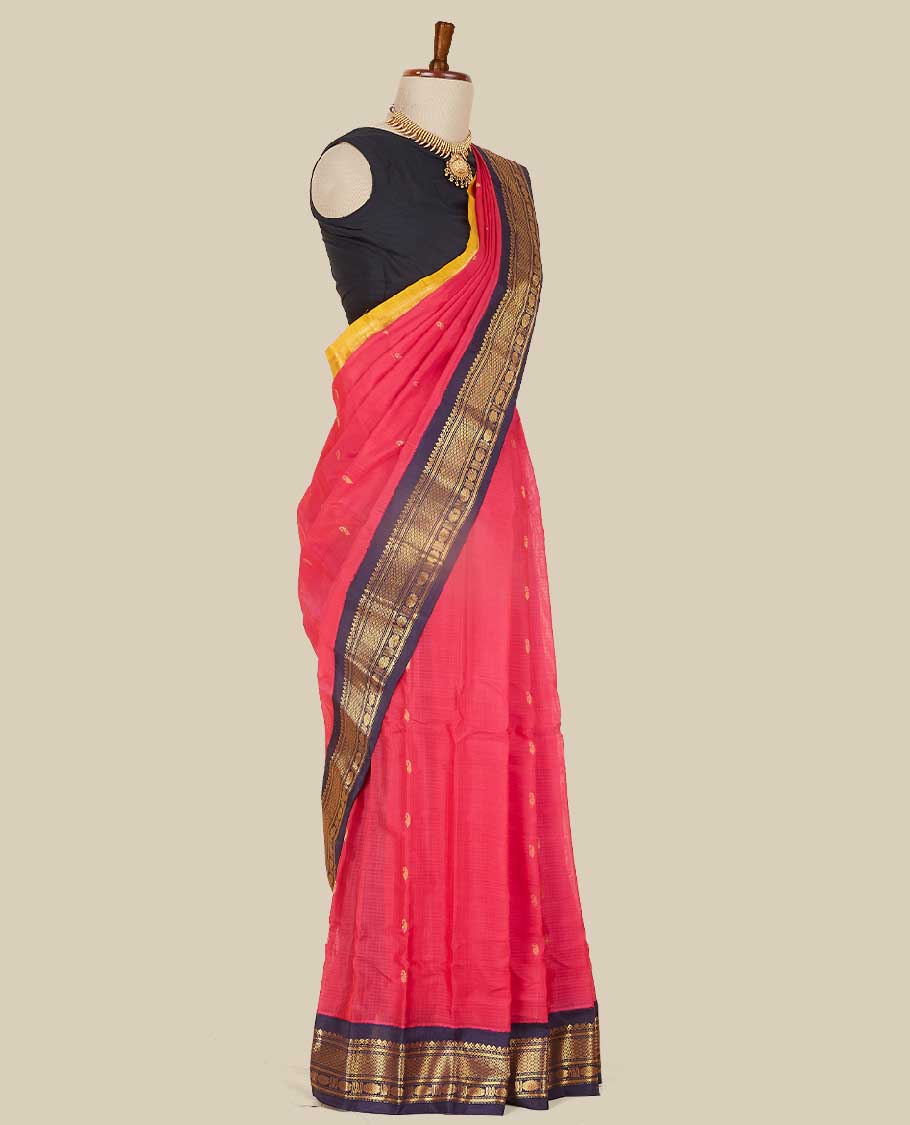 Peach gadwal cotton saree with paisley buttas, ganga jamuna border of chevron & rudraksha, intricately designed pallu