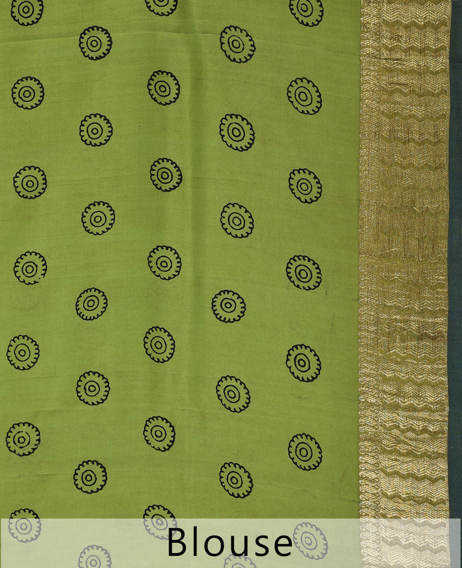 Yellow handpainted pen Kalamkari silk saree with floral design, contrast kanchi border & pallu of intricate floral jaal