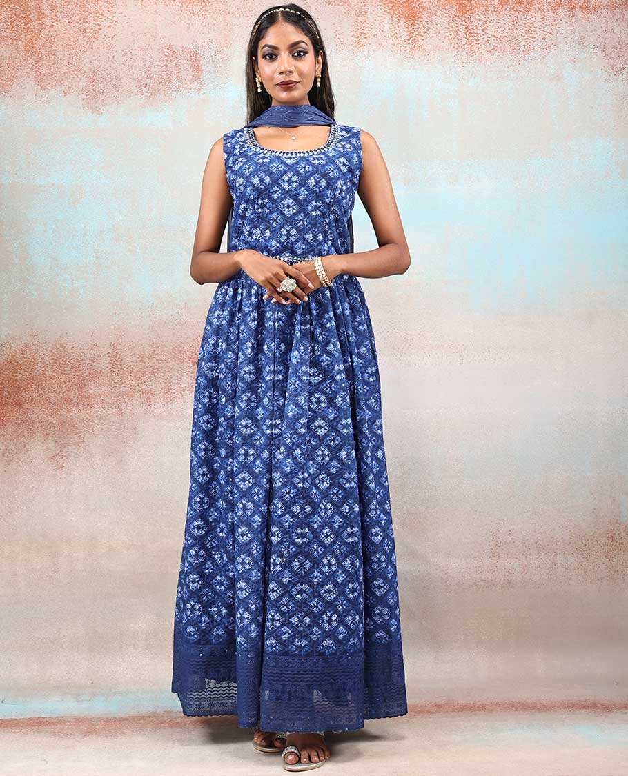 Blue printed georgette Anarkali features intricate motifs, mirror work neck & thread embroidered border & dupatta