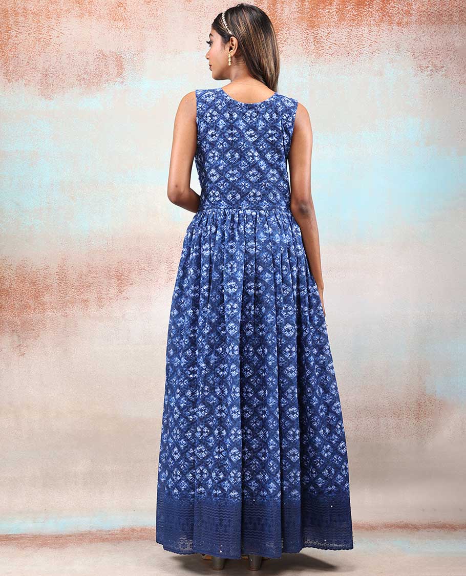 Blue printed georgette Anarkali features intricate motifs, mirror work neck & thread embroidered border & dupatta