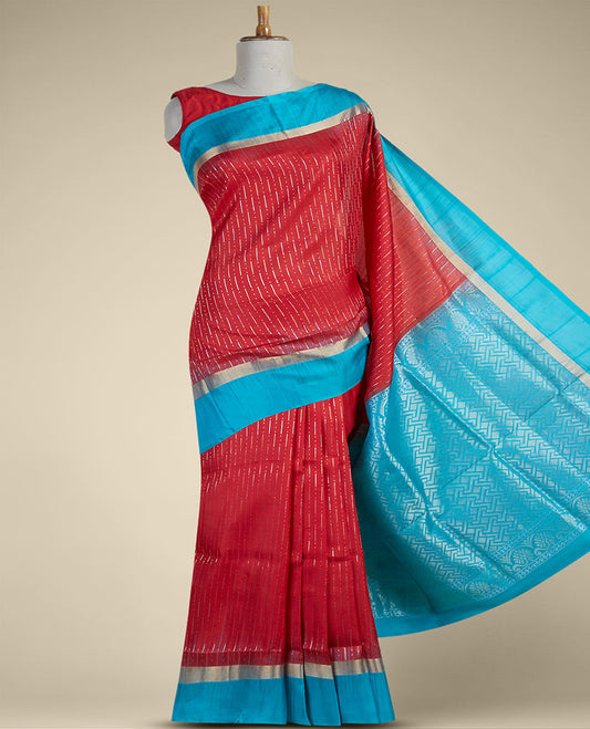 Red soft silk saree with tiny zari buttas on its body, contrast double-side zari border & intricate pallu 