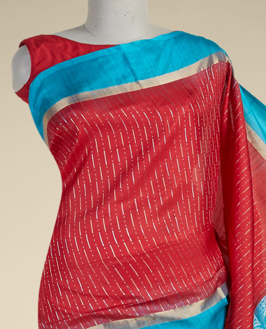 Red soft silk saree with tiny zari buttas on its body, contrast double-side zari border & intricate pallu 
