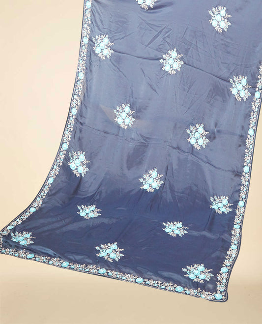Grey embroidery satin silk saree bedecked with blue colour floral designs all over its body & pallu, embroidery border