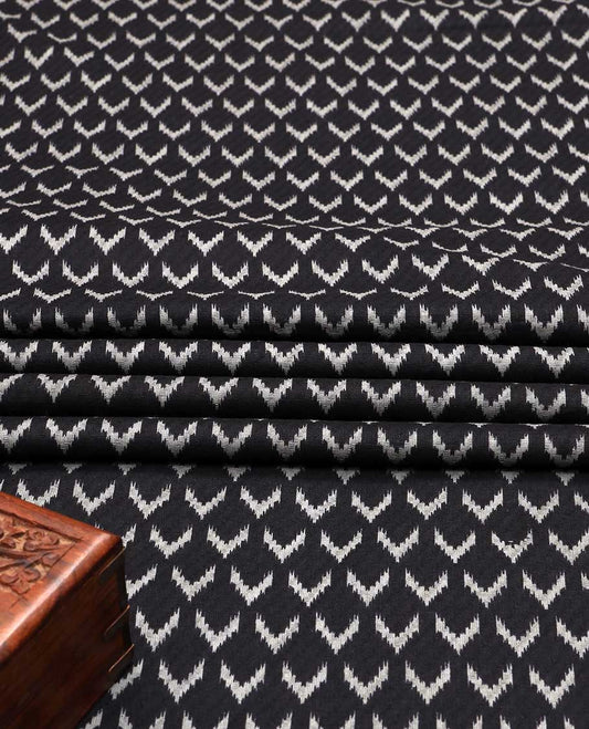 Black ikkat-style motifs printed cotton multi-use material
