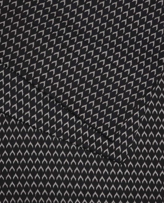 Black ikkat-style motifs printed cotton multi-use material