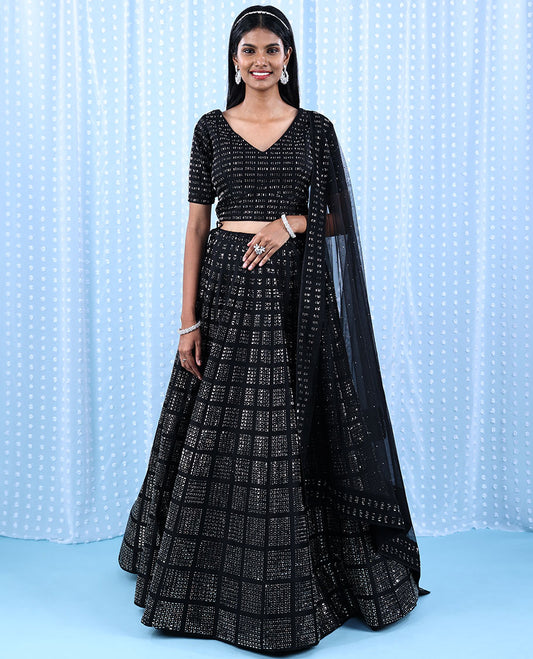 Black georgette readymade lehenga, checked deisgn skirt in square & round shape stone & v-necked stone work crop top