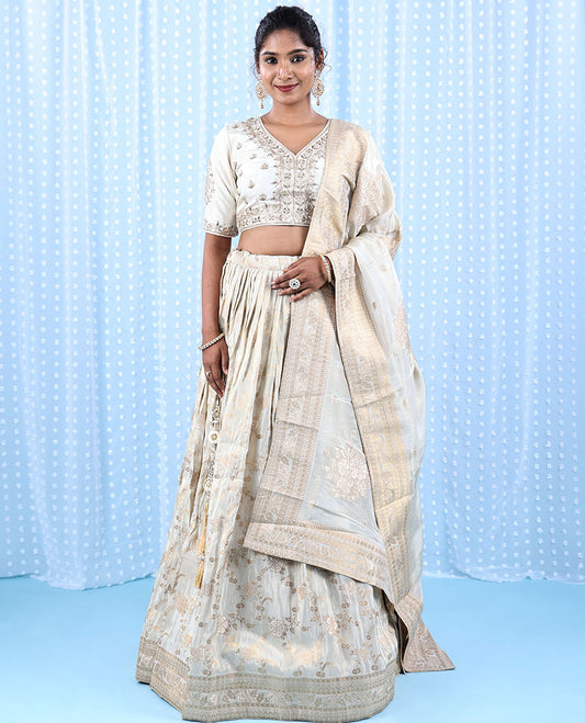 Buttercream raw silk readymade lehenga,thread & stone embroidered crop top, floral jaal banaras skirt & banaras dupatta 
