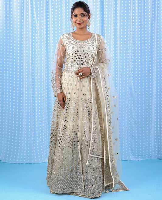 Buttercream intricate silver thread & gota patti embroidered readymade 3/4th sleeveless net cape lehenga 