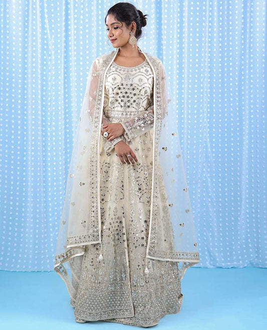 Buttercream intricate silver thread & gota patti embroidered readymade 3/4th sleeveless net cape lehenga 