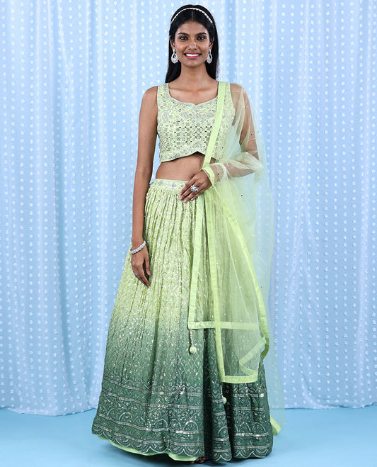 Green georgette readymade lehenga with chamki & mirror embroidered double shade skirt, intricate crop top & net dupatta