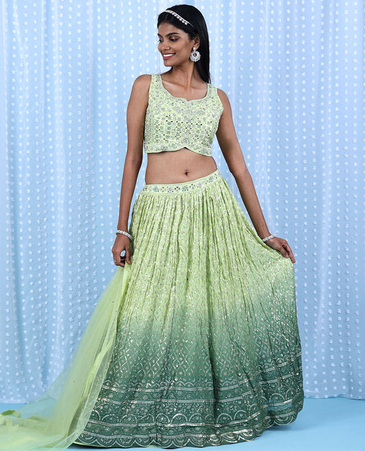 Green georgette readymade lehenga with chamki & mirror embroidered double shade skirt, intricate crop top & net dupatta