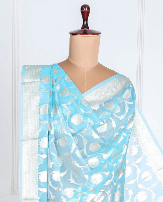 Powder  blue zari jacquard banaras dupatta features intricate floral jaal design with tassels