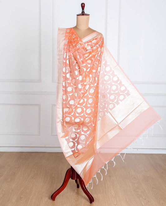 Pastel orange Banaras-style organza dupatta features floral jaal designs with tassels