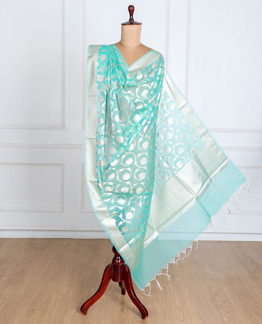 Pastel blue Banaras-style organza dupatta features floral jaal designs with tassels