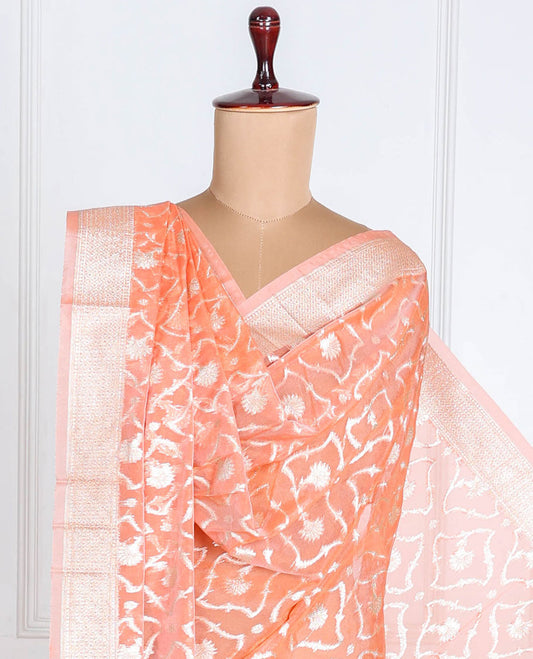 Cantaloupe orange banaras-style organza dupatta features floral jaal designs with tassels