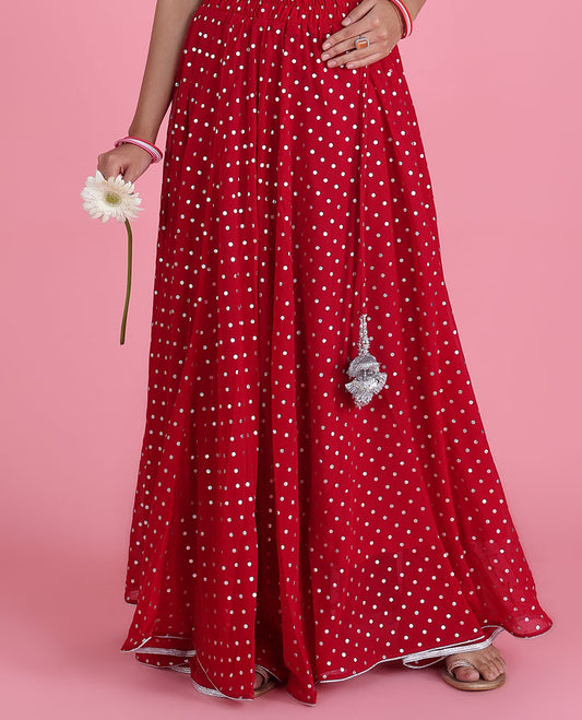 Pink tiny polka dot foil printed georgette skirt with latkan tassels