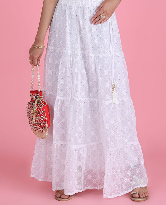 White argyle design embroidered with sequin work georgette skirt with latkan tassels 