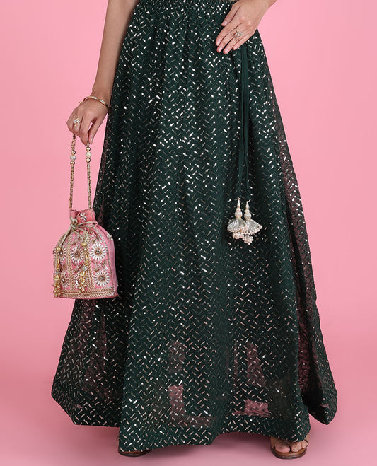 Dark green georgette skirt features chevron design sequin embroidery & latkan tassels 
