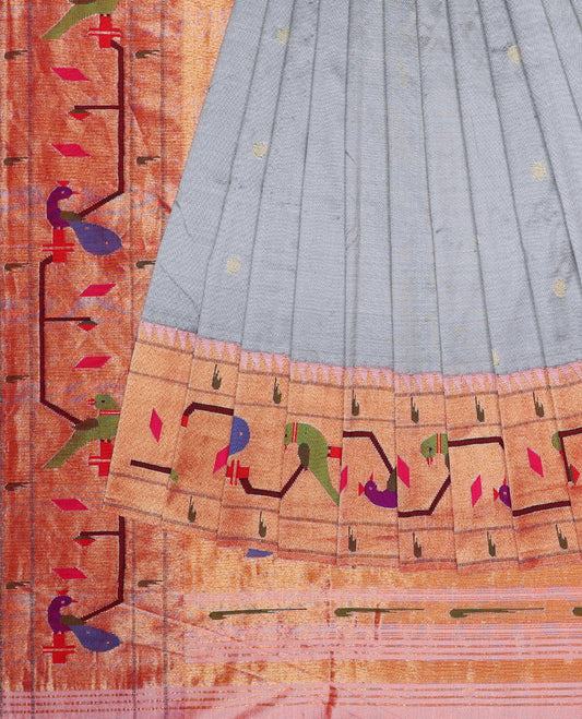 Grey paithani silksaree with buttas, contrast muniya border & pallu features floral vine, swans, peacock & parrots 