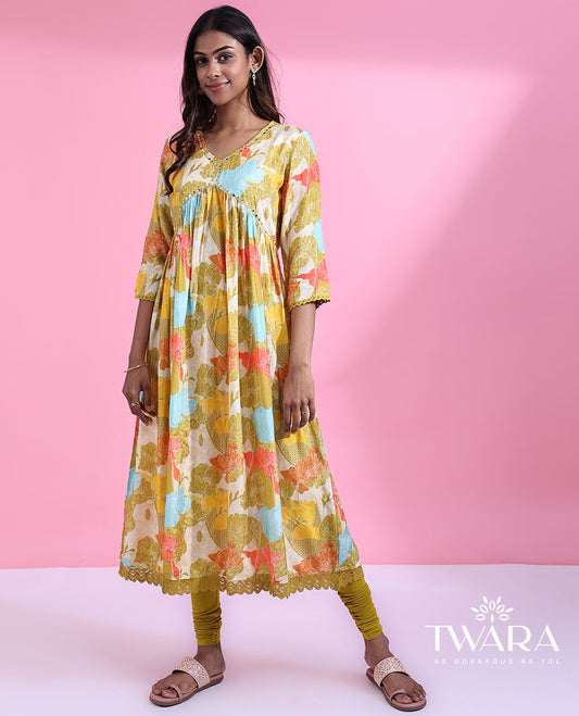 Twara kaleidoscopic-colored floral printed with mirror embroidered 3/4th sleeve cotton lace border v-neck kurti 