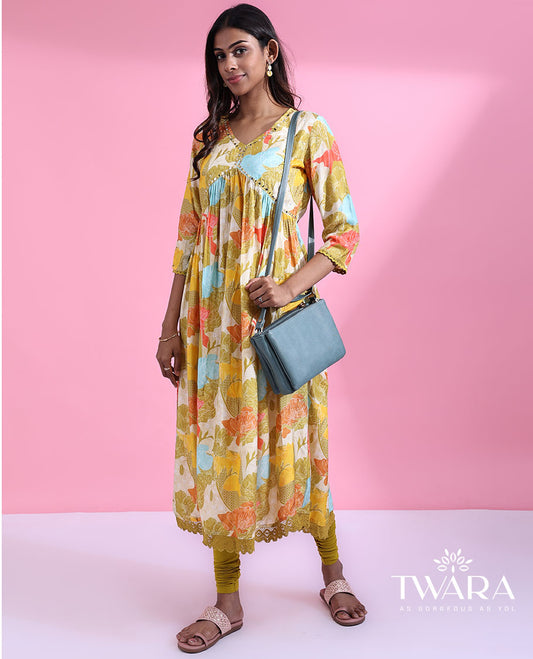 Twara kaleidoscopic-colored floral printed with mirror embroidered 3/4th sleeve cotton lace border v-neck kurti 