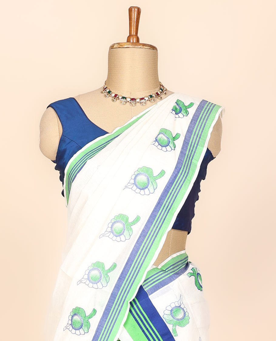 Buttercream printed kerala mundu set with leaf designs, contrast striped border 