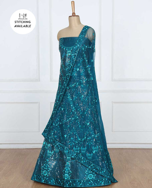 Dark teal blue lehenga set features intricate sequins & thread embroidered net skirt, top & patch border net dupatta