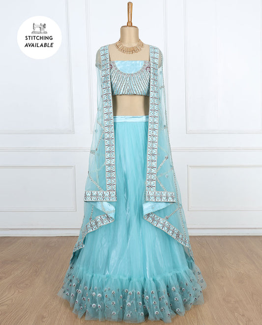 Enthralling blue lehenga set features plain ruffle net skirt with sequins embroidery,intricate embroidered top & dupatta