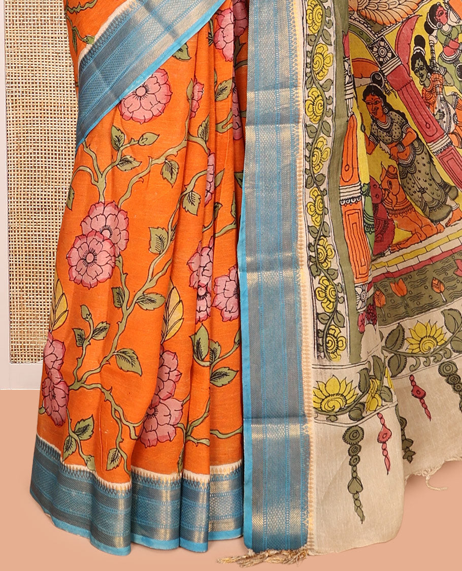 Orange Kalamkari Silk Saree, Styled with Floral Vine Print, a Contrast Traditional Zari Border, Human Motifs Pallu, and a Contrast Blouse