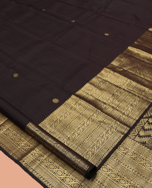 Brown Kanchipuram Silk Saree, Elevated with Zari Buttas, Highlighted by Zari Border of Manga, Paisa, Diamond, Neli, Cross Kamalam, Kathir, and Cross Neli, Jaal Pallu, and a Matching Blouse
