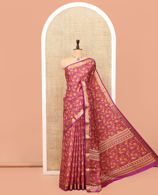 Magenta Printed Silk Saree Features an Intricate Design, a Traditional Zari Border, an Intricate Pallu, and Matching Blouse