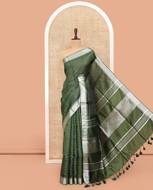 Green Banana Pith Saree, Lightly Embellished with Buttas All Over Its Body, Highlighted by a Zari Temple Border, Gleaming Zari Striped Pallu, and Paired with a Matching Blouse