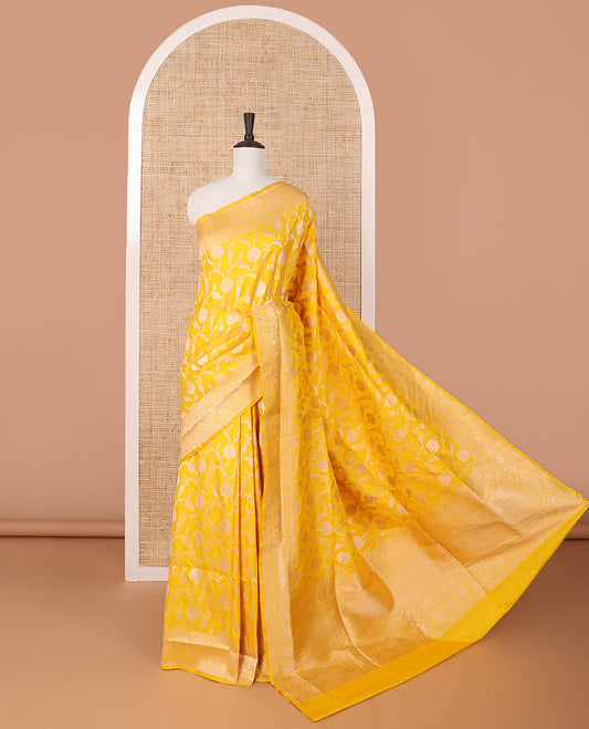 Yellow floral jacquard banaras silk saree with self intricate zari border & floral zari design pallu
