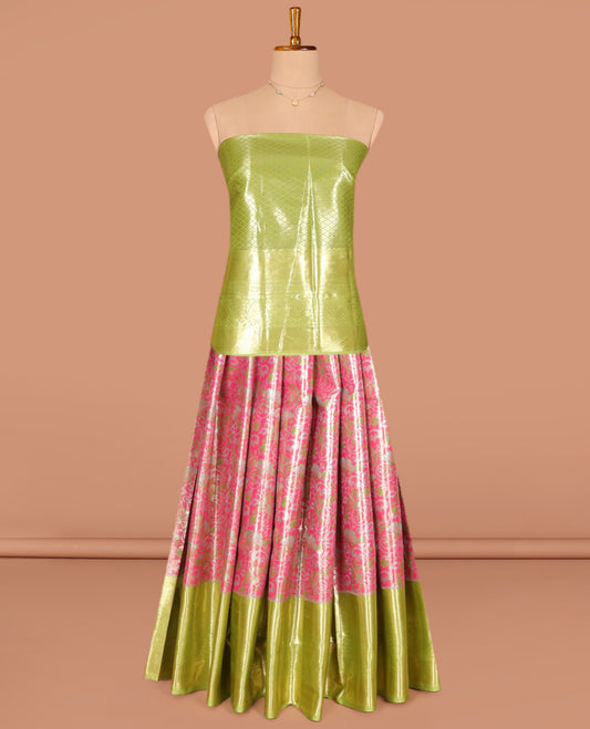 Pink Art Silk Pavadai Material Set, Elegantly Highlighted with Floral Jacquard Designs on Its Skirt, Complemented by a Contrast Traditional Zari Design Border, and Paired with a Contrast Jacquard Blouse