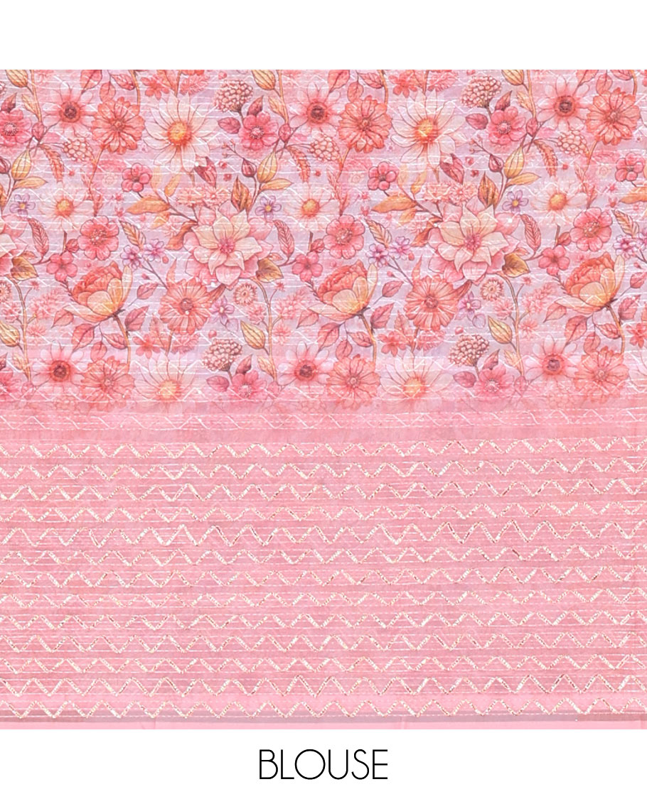 Borderless pink sparkling glittered russel net saree, self-pallu and a floral print with zig-zag embroidered blouse