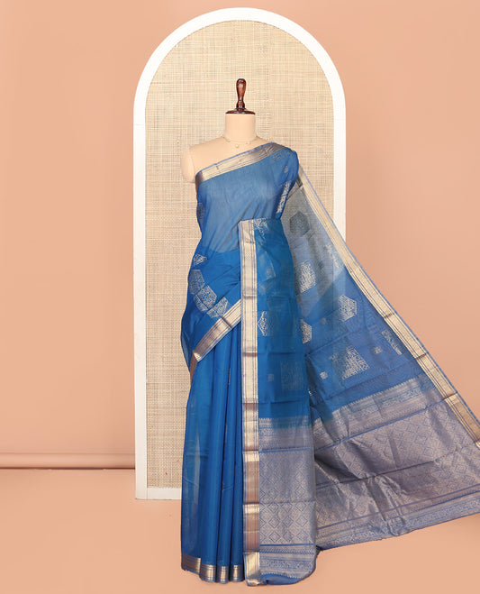 Blue Silk Cotton Saree, Accentuated with Geometric Buttas All Over Its Body, Highlighted by Traditional Zari Designs Woven Border, Intricately Designed Pallu and Paired with a Matching Blouse