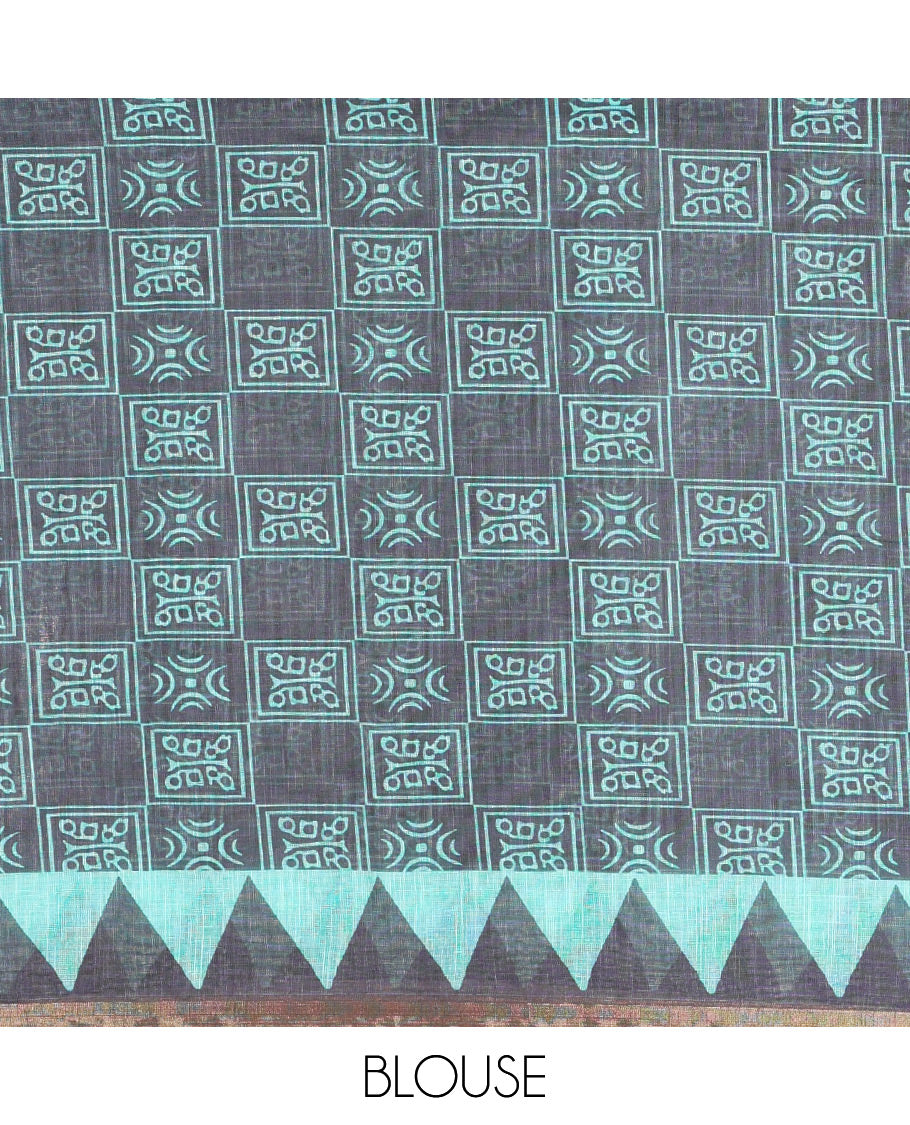 Green vertical stripes printed linen cotton saree, a temple-printed border, big polka dot printed pallu, and a printed blouse