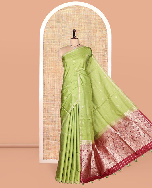 Leaf Green Satin Silk Saree, Enthralled with Zari Buttas, a Subtle Piping Border, Complemented by a Contrast Intricately Designed Pallu, and a Contrast Blouse
