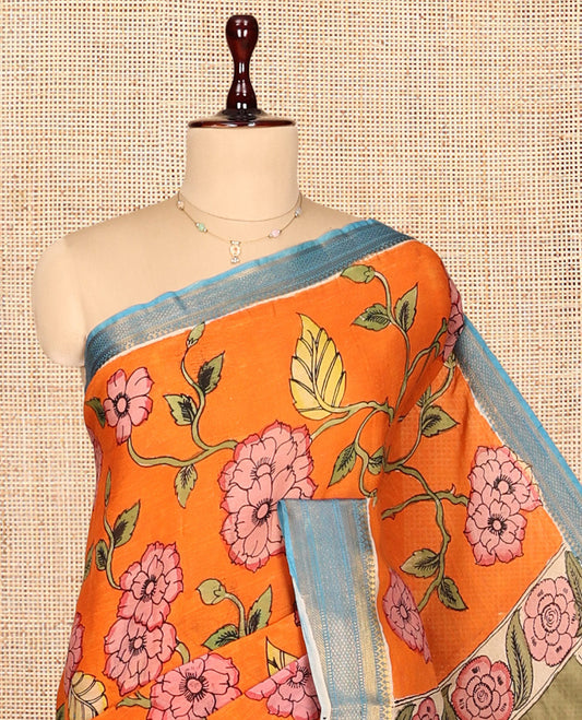 Orange Kalamkari Silk Saree, Styled with Floral Vine Print, a Contrast Traditional Zari Border, Human Motifs Pallu, and a Contrast Blouse
