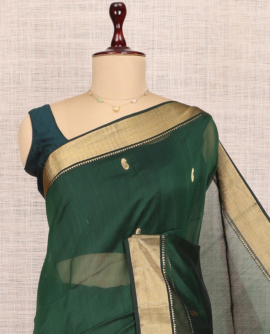 Green Maheshwari Cotton Saree, Elevated with Buttas, Highlighted by a Traditional Zari Border, Pallu of Paisleys, and a Matching Blouse