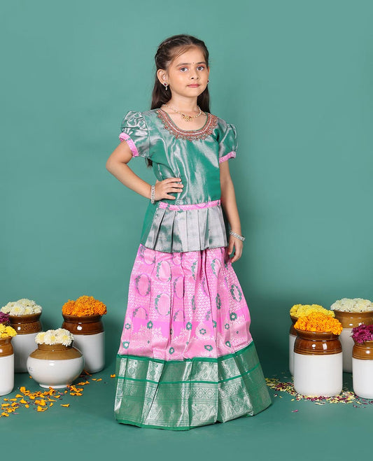 Pink art silk readymade pavadai set, jacquard with contrast traditional zari border skirt, and contrast round neck embroidered puff-sleeve blouse