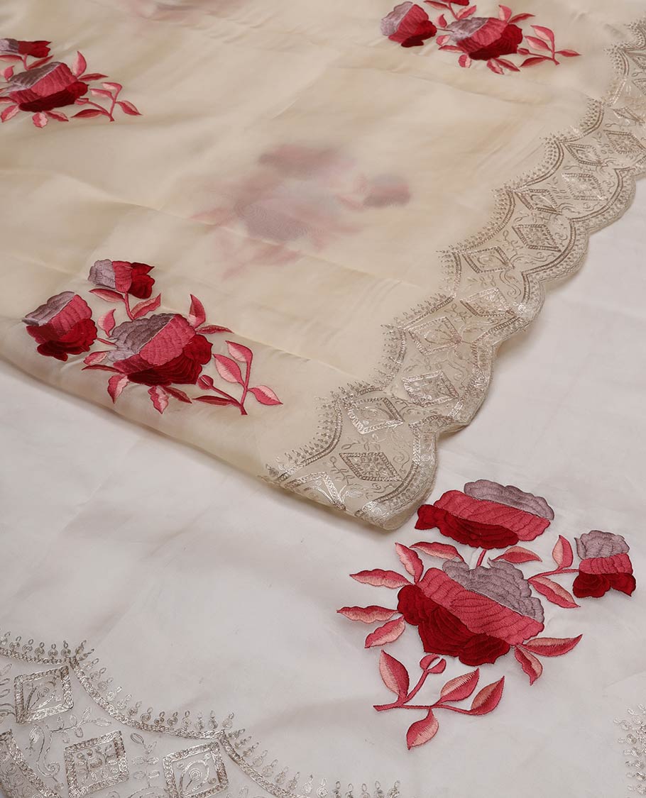 Cream rose motifs organza saree with self embroidery, scallop border