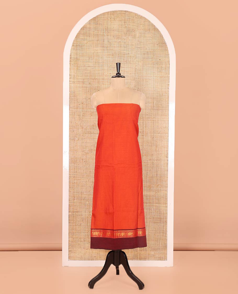 Orange Plain Mercerised Cotton Material Churidar Set, Complemented by Contrast Elephant Motifs Woven Zari Border, Comes with a Plain Mercerised Cotton Bottom, and Is Paired with a Matching Mercerised Cotton Dupatta Mirroring the Same Design