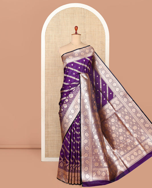 Violet Semi-Banaras Saree, Opulently Embellished with Buttas and Diagonal Stripes All Over Its Body, Highlighted by a Floral Creeper Design Border, Intricately Designed Pallu, and Paired with a Matching Blouse