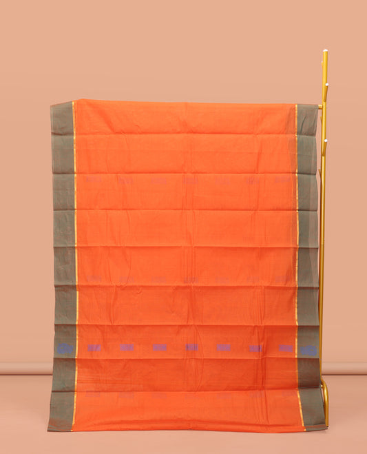 Orange Kanchi Cotton Saree, Adorned with Buttas on Its Body, Complemented by a Contrast Unique Design Border, Jaal Design Pallu, and a Matching Blouse